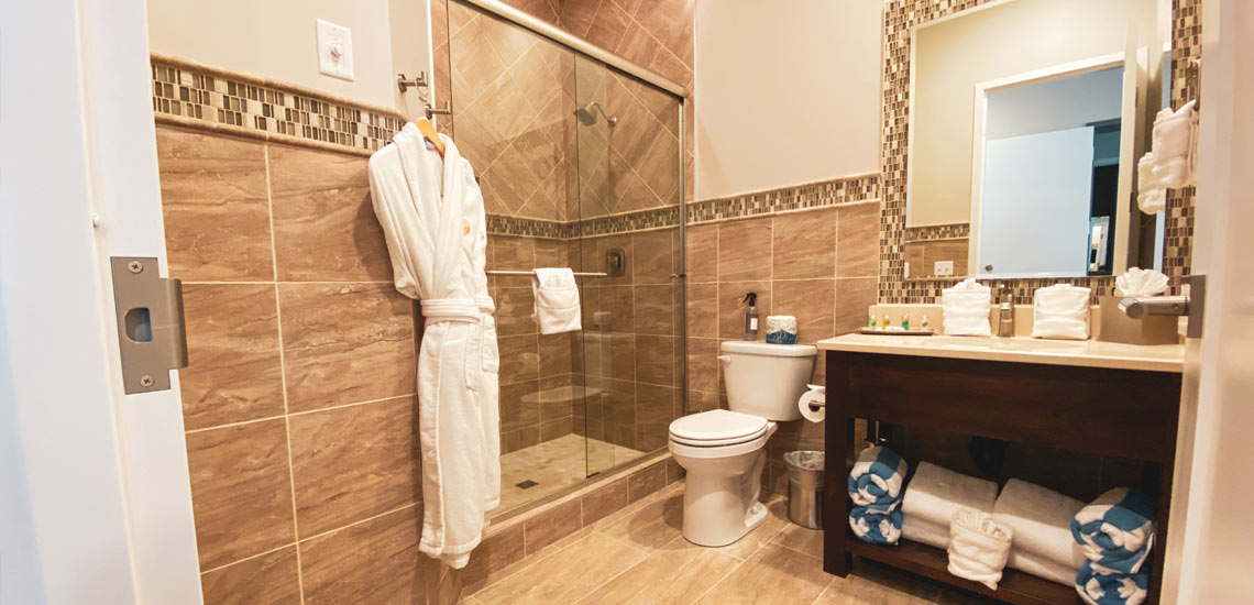 Image of unit bathroom at Huff House Inn and Cabins