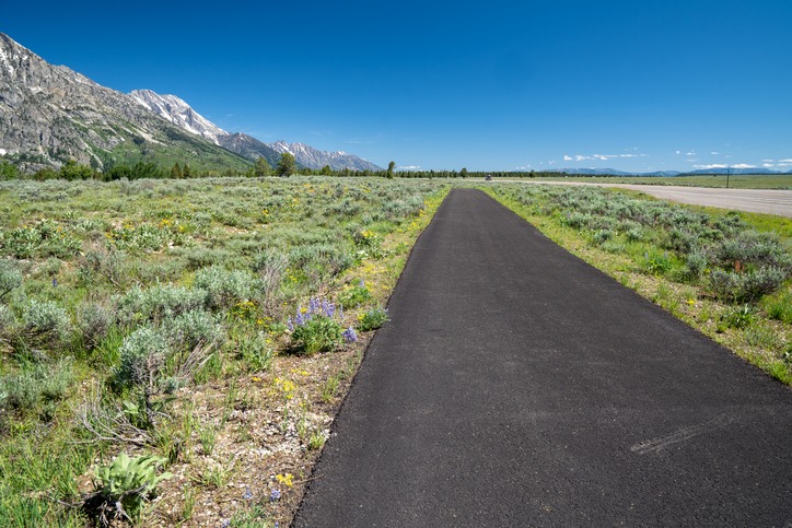 multi use pathway great for biking in grand teton national park in the fall